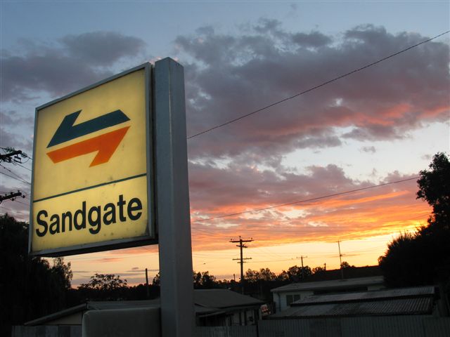 
A night view of the illuminated station sign.
