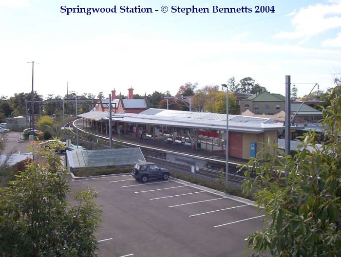 
Looking down at Up Main and Platform 1 from the adjacent multi-storey
commuter carpark.
