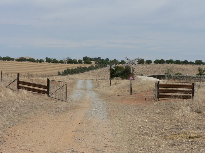 The view looking west. The stone wall on the right borders a cemetery which stands opposite the one-time location.