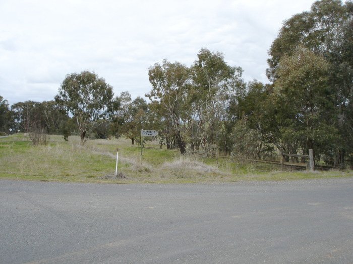 The view looking east from the adjacent road crossing shows no sign of the station.