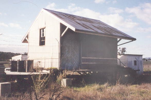 
The small goods shed, which appears to be a much shortened version of 
the G2 type. This was being used as a storage depot for road crews at the 
time this photograph was taken.
