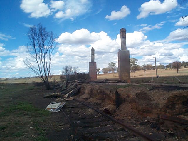 
Only the chimneys and some corrugated iron remain of the station building.
