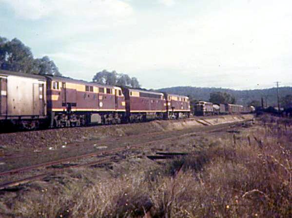 A crossing of trains at The Rock.