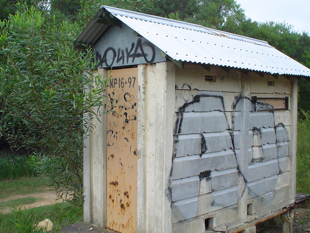 A closer view of the abandoned signal hut.