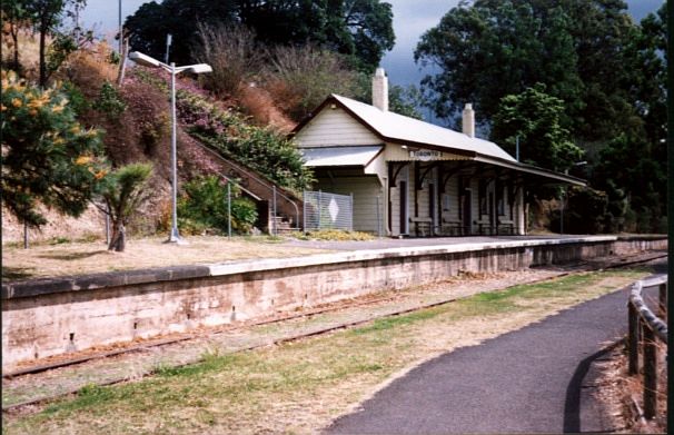 
The platform and station are built into a cutting, with a main road running
above roof level behind the station.
