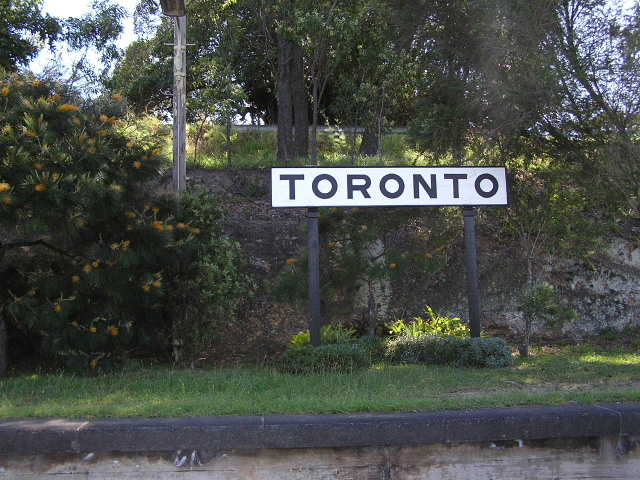 The restored station name board on the platform.