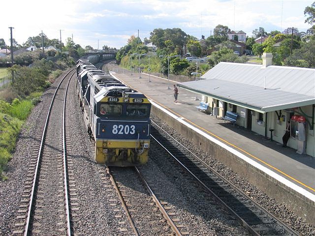 
8203 heads a loaded coal train past the station, in this view looking towards
Maitland.
