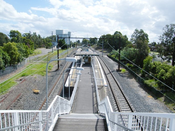 A view looking west from the footbridge of the station.
