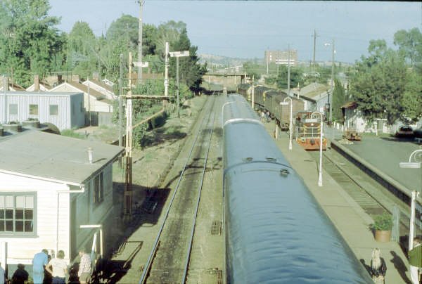 A very late running No.4 Spirit of Progress due to locomotive failure sits opposite the Signal Box at Wagga Wagga. The view looking south shows the rear of the train with the two sleeping cars.