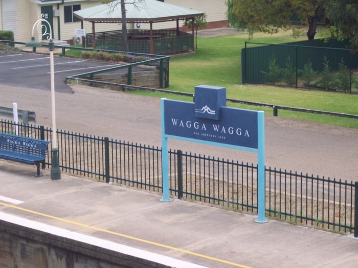 The modern name board on the platform.