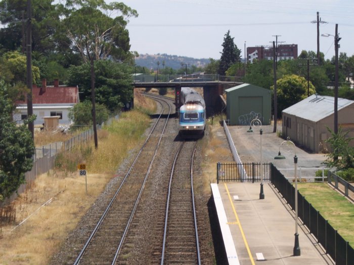 A Sydney-bound XPT service approaches the station from the west.