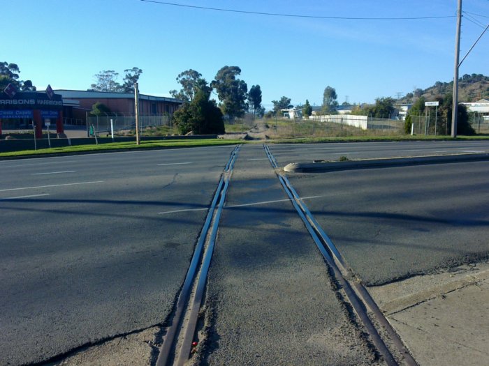 The view of the former Tumbarumba branch line looking back towards Wagga were it crosses Lake Albert Rd.