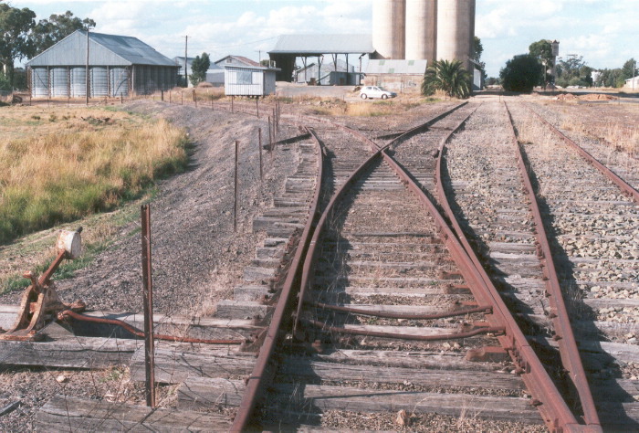 The Corowa end of the back siding showing the point throw and derailers on this siding and the 'silo' siding. The main line is on the right.