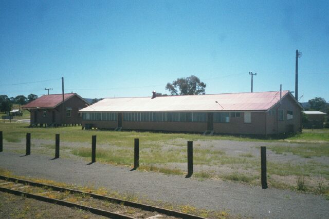 
The view looking west of the goods store shed and crew barracks.
