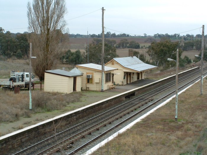 The view looking down to the up platform. The centre building is the former signal box.