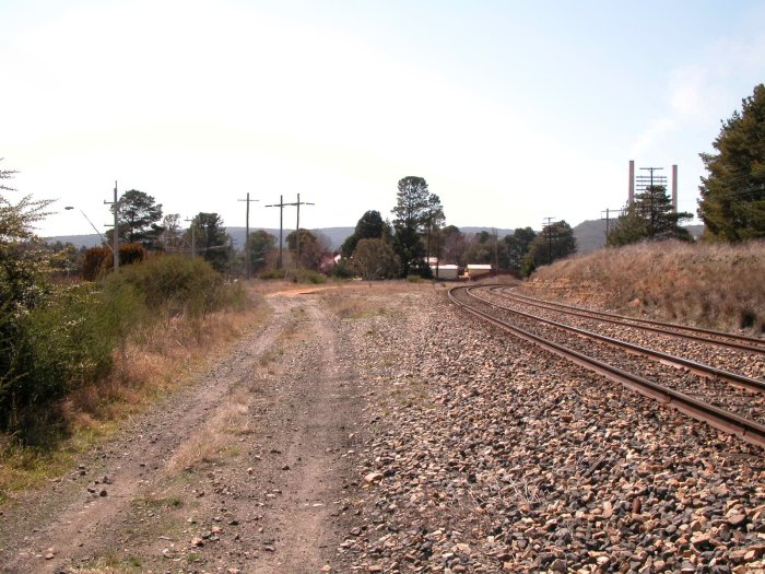 The view looking up the line, and the Sydney end of the yard.  The vehicle track follows the path of the former Wallerawang Colliery branch.  Access is now via Coxs River Junction, approximately 1km further along.