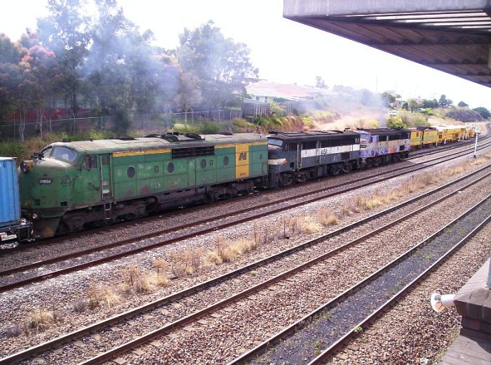 The view from Hanbury Junction signal box of a passing feight train.