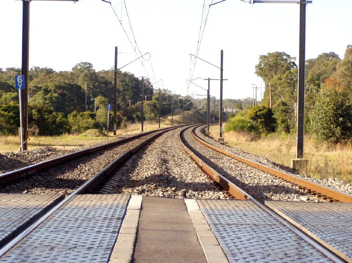 The view looking north beyond the level crossing.