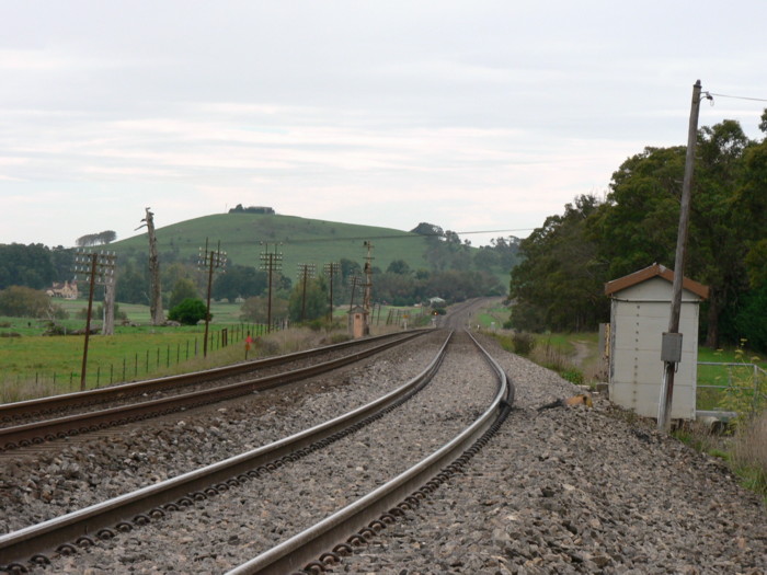 The view looking north. The station was located on both sides of the line just beyond the traffic hut in the foreground.