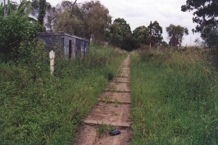 
The approach from the north to Whitebridge station.  The station location
was just beyond the Gangers Shed on the left hand side.
