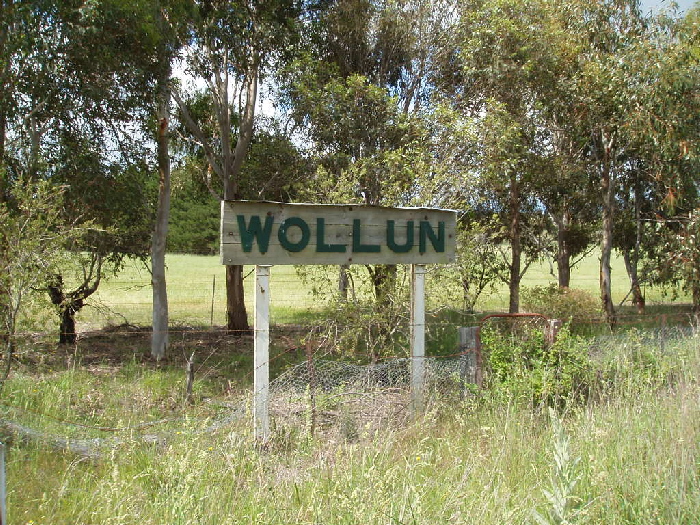 The old nameboard on a property next to the road.