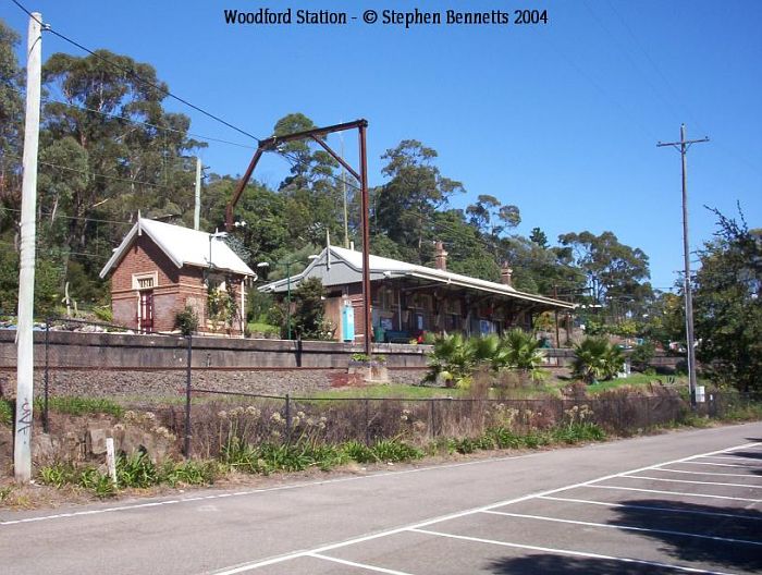 
The view of platform 1 and the Up Main looking up from the old highway, now a
commuter carpark.  The small building is the Lamp Room, located at the
Sydney end of platform.
