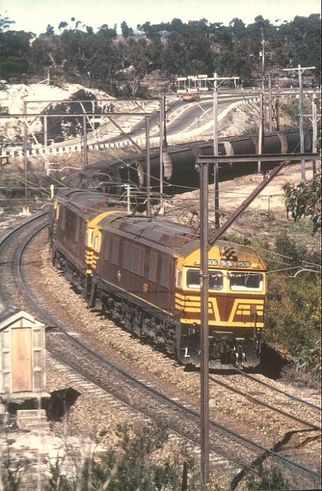 
8506/7/8 head an up coal train near the Woodford Bends.
