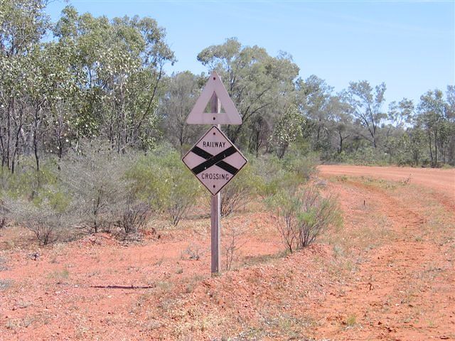 
The level-crossing warning sign, faded by temperatures reaching over 50C,
near Wyuna Downs.
