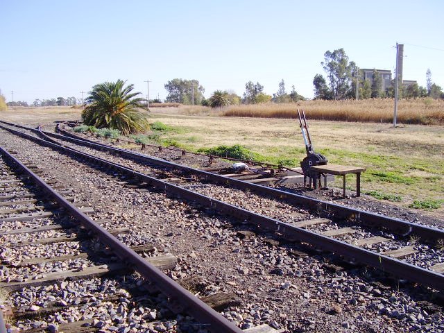 From 'D' frame a short spur turns to the right - this appears to have originally continued across an irrigation channel to the now-decommissioned power station that can be seen in the distance.