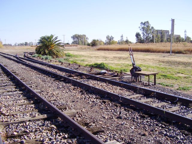 From 'D' frame a short spur turns to the right - this appears to have originally continued across an irrigation channel to the now-decommissioned power station that can be seen in the distance.