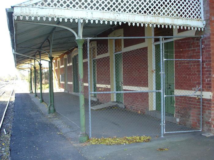The view looking along the fenced off station shelter area.