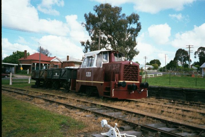 
Preserved X200 class rail tractor X203 is sitting in the yard with a pair of
S class wagons.
