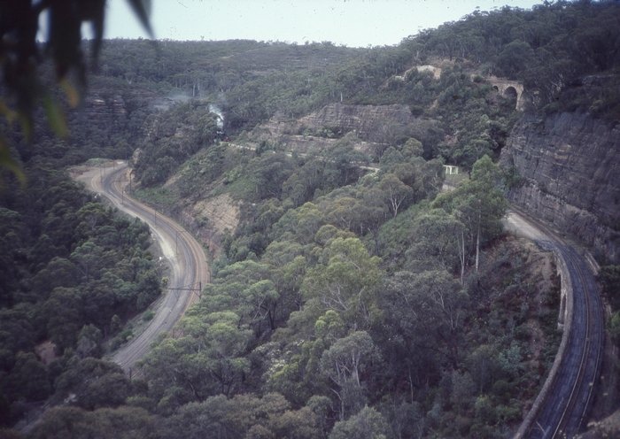 All three roads of the Zig Zag can be seen here. The smoke is from a train emerging from the tunnel on the middle road.